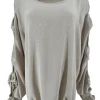 Blouse met ronde hals en open mouw met strikjes beige