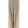 Uitlopende broek met knoopjes op de plooi beige