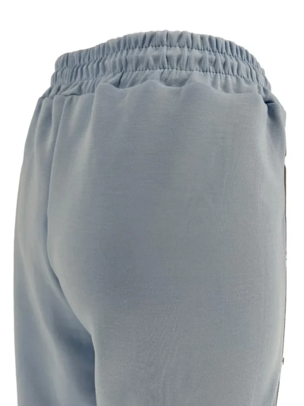 Wijde broek met sterretjes bies licht blauw.(gts)