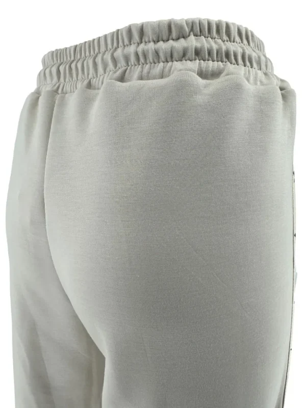 Wijde broek met sterretjes bies beige.(gts)